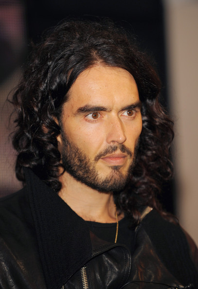 From the moment I first saw him doing his stand-up stuff, I thought he was hilarious. And yes ok, I quite fancy him too! Even though he&#39;s all long and lean, ... - russel-brand-russell_brand_looking
